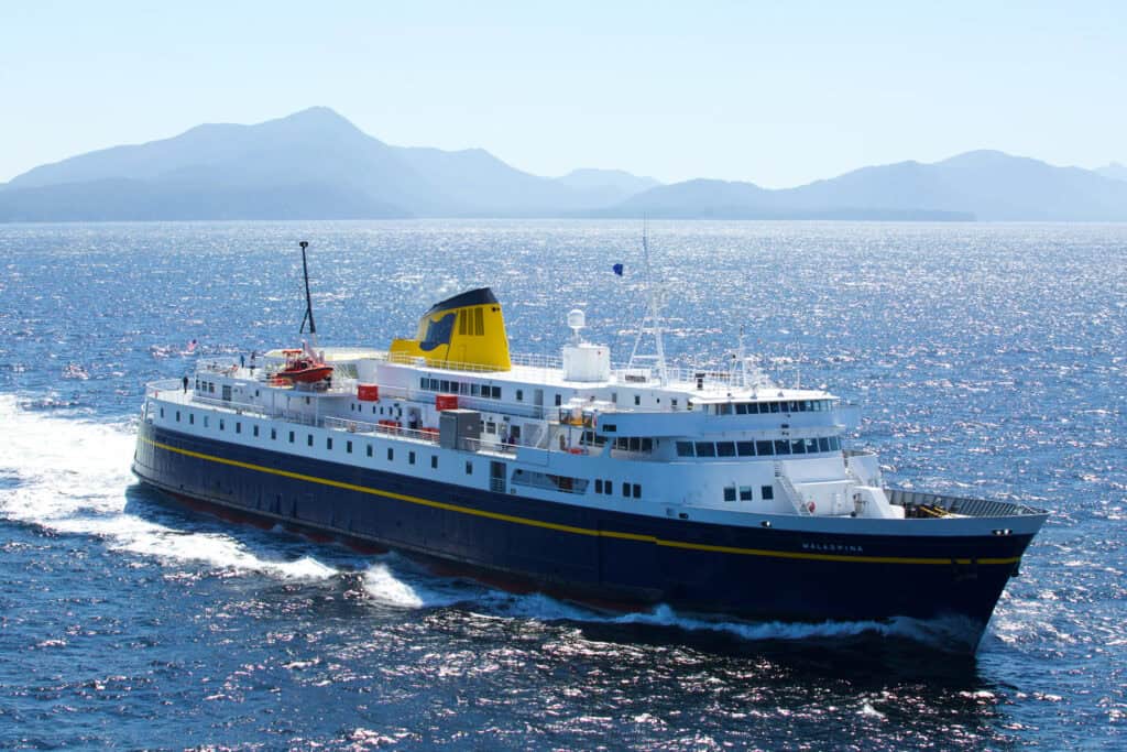 A large ferry boat traveling on the ocean.