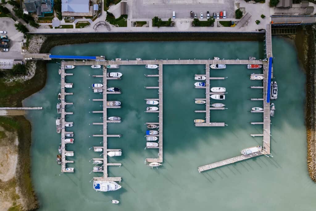 An aerial view of a marina with boats docked.